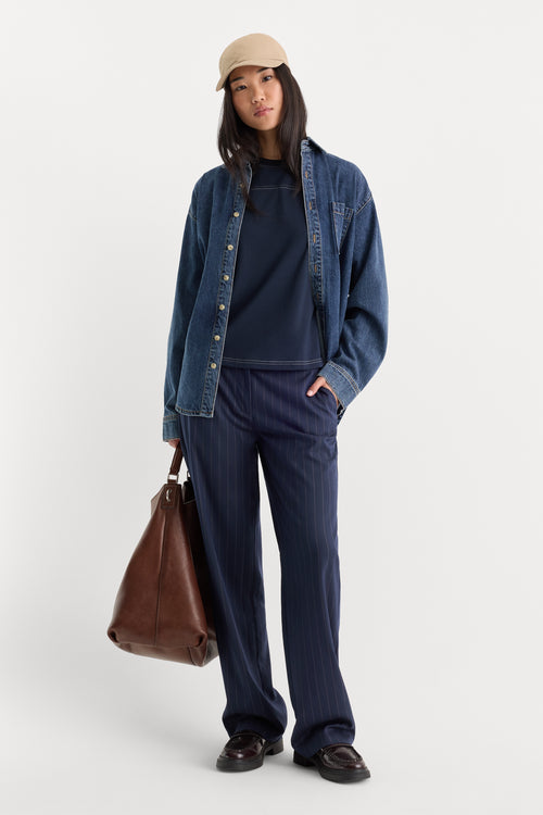 THE LOW RISE STRAIGHT LEG TROUSER | NAVY PINSTRIPE-1 | GOOD AMERICAN | MODEL