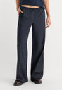 THE PINSTRIPE PULL ON TROUSER | NAVY PINSTRIPE-3 | GOOD AMERICAN | MODEL